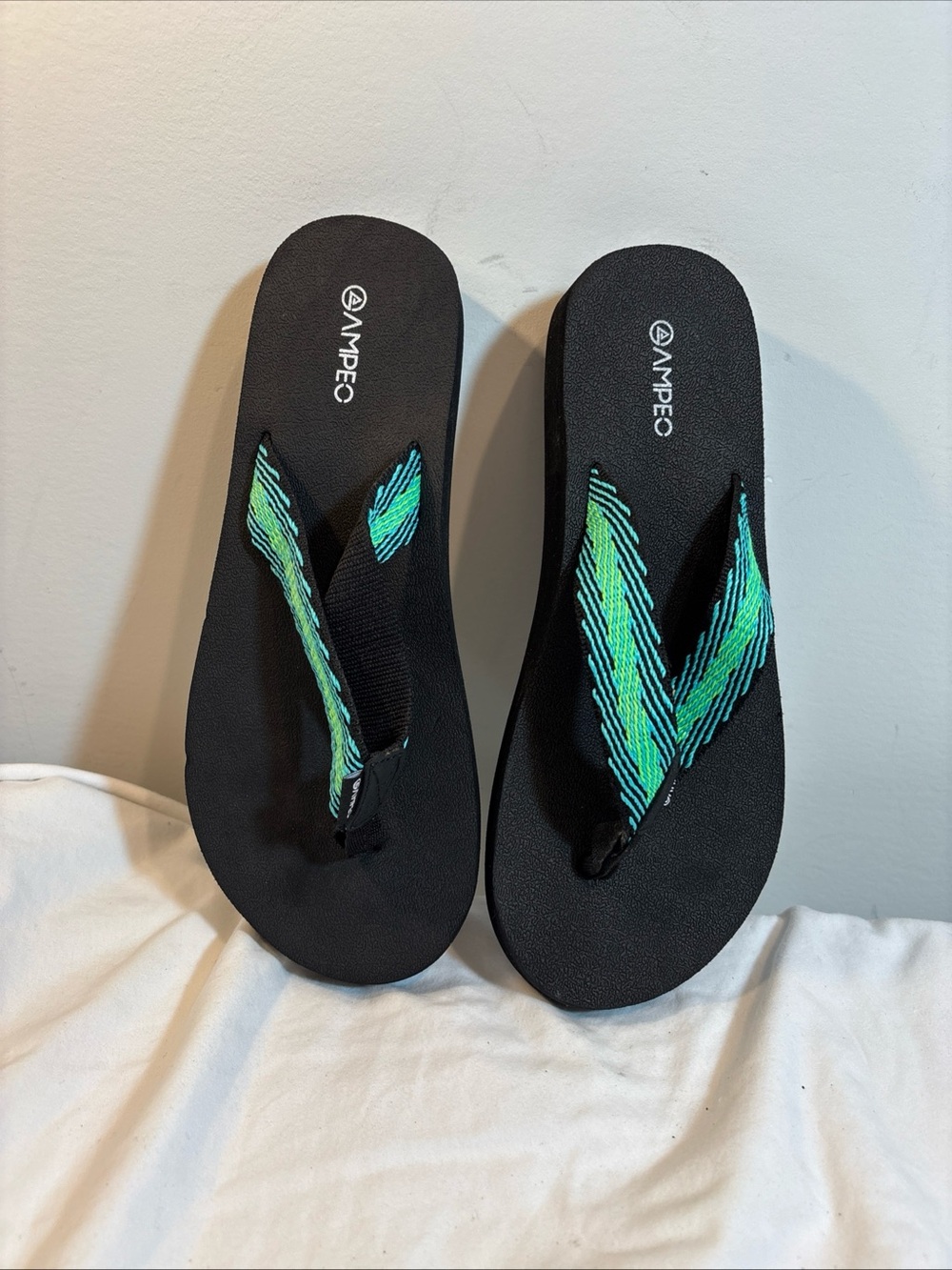 Women's Black Flip Flop Sandals with Green Striped Straps